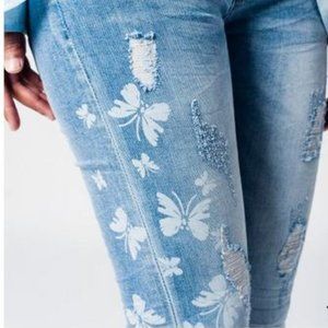 Light Wash Skinny Jeans With Butterfly Pattern
